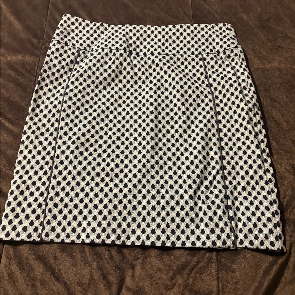 Straight, stretchy, just above knee navy blue, light green and white.